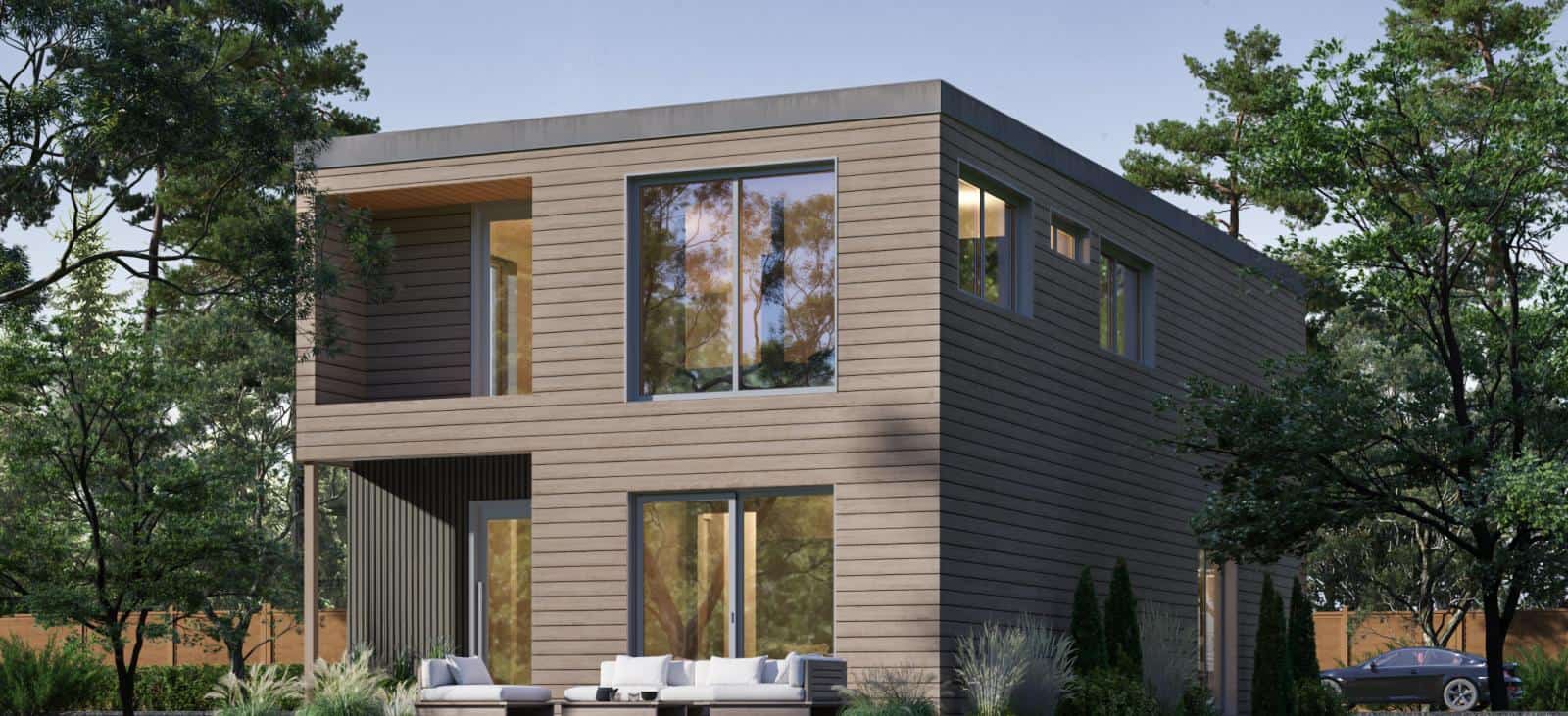 Harper prefab home by Dvele rear exterior with large deck.